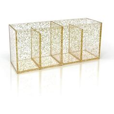 three gold glittered vases sitting side by side