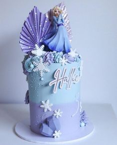 a frozen princess cake with snowflakes on it