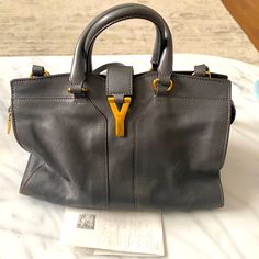 Reposhing This Item I Purchased From @Chicclosetchi. Loved It, But Ready To Rotate For Something New. * Comes With A Dustbag And Will Be Authenticated Via Poshmark * Some Signs Of Wear On "Back" Side Of Bag *You Want It, Not Me! Make Me An Offer! Questions? Leave A Comment Below! Ysl Cabas Bag, Bags Ysl, Saint Laurent Bags, Yves Saint Laurent Bags, Not Me, Cross Body Handbags, Something New, Yves Saint Laurent, Duffle Bag