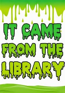 the words it came from the library are green and white with dripping paint on them