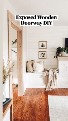 a living room with wood floors and white walls, the text exposed wooden doorway diy