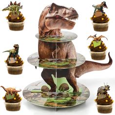 cupcakes with dinosaur images on them are arranged in the shape of three tiered trays