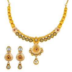 Immerse yourself in luxury with this exquisite 22k antique gold jewelry set by Virani Jewelers. This fabulous gold necklace and earring set is a work of art, featuring intricate designs and vibrant Kundans and rubies that capture the essence of Indian craftsmanship. Indulge in the beauty of 22k gold jewelry and make a statement of sophistication with this beautiful antique gold jewelry set.Features• 22k yellow gold• Kundan• Ruby• Antique finish• Engraved detailsNecklace Specifications:• Minimum Yellow Temple Jewelry With Intricate Design, Red 22k Gold Jewelry With Intricate Design, Ornate Kundan Necklace In 22k Yellow Gold, Ornate 22k Yellow Gold Kundan Necklace, Ornate Dual-tone Gold Jewelry, Gold Ruby Jewelry Sets With Meenakari, Gold Temple Necklace With Intricate Ruby Design, Gold Ruby Necklace With Intricate Design, Ornate Yellow Gold Kundan Necklace With Intricate Design