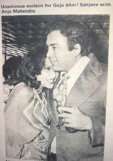 an old black and white photo of a man and woman smiling at each other while holding glasses