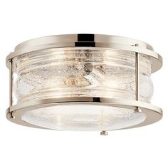 a flush light fixture with clear glass