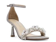 a women's high heeled sandal with pearls