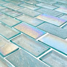 a close up view of some glass tiles