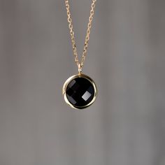 Dainty black onyx necklace in 14K solid gold. Simple and dainty necklace for women who love colors. The best gift for her. 100% handcrafted with love! PRODUCT DETAILS ● Material: 14K solid gold - white gold - rose gold ● Gemstone: Black onyx, round briolette cut ● Stone Diameter: 10mm (0.4in) ● Length: 39cm (15.5in) to 45cm (17.5) HOW TO ORDER - CUSTOM ORDERS ●Choose from the drop down menus the available options (Metal, Length) and leave us a note for any special requirements. ●For special orde Classic Black Necklace With Round Pendant, Black Faceted Jewelry As A Gift, Gold Onyx Jewelry For Anniversary, Classic Black Necklaces With Round Pendant, Gold Onyx Jewelry For Anniversaries, Black Faceted Jewelry For Gift, Black Round Minimalist Charm Necklaces, Minimalist Black Charm Necklaces, Minimalist Black Round Charm Necklaces