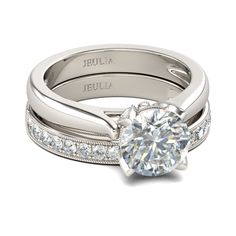 a white gold engagement ring set with diamonds