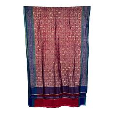 A lavish sari from India, hand-crafted out of a single piece of silk brocade. Mid 20th Century, circa 1970. Gold Paisley brocade on burgundy / deep red silk, with blue, green and gold lateral trim. Fully reversible with opposite colors.   Can be used as a throw, wall tapestry, curtain or bedspread.   Measures 107" long, 43" wide. Traditional Burgundy Dupatta For Festive Season, Traditional Burgundy Saree For Festive Occasions, Burgundy Traditional Wear For Festivals, Traditional Burgundy Wear For Festivals, Bollywood Style Burgundy Dupatta In Traditional Drape, Bollywood Style Burgundy Dupatta, Ceremonial Silk Shawl With Traditional Drape, Red Silk Shawl With Zari Work, Vintage Ceremonial Dupatta For Festive Occasions