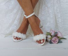 .Bridal white pumps Shoes ideal for your wedding or any event, these bridal shoes are flowers decorated with pearls and andthat give striking details. Full sizes only ** If you have half the size, go UP to the nearest full size ** If you are unsure of your size, please contact me so I can assist you. ★ More Wedding shoes: https://www.etsy.com/listing/751419113/bridal-block-heel-wedding-shoes-strappy?ref=shop_home_active_3&pro=1&frs=1 https://www.etsy.com/listing/746075967/wedding-shoes-wedding-s Pearl Embellished High Heel Wedding Shoes For Spring, Pearl-embellished High Heel Wedding Shoes For Spring, Spring Wedding Closed Toe Shoes, Spring Wedding Closed-toe Shoes, Spring Wedding Shoes With Block Heel, Elegant Summer Wedding Shoes For Ceremony, White Heels For Spring Ceremony, White Heels For Spring Ceremonies, White Almond Toe Sandals For Wedding