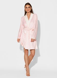 Ideal for a spa get-away or staycation, the Pink Stripes short robe is made from luxurious microfiber for that all day loungewear vibe. The flattering classic striped print includes a matching belt for cinching at the waist. One size Short bath/lounge Robe Shawl collar 2 bottom side pockets Sewn in belt Made of soft and absorbent microfiber Machine wash cool Tumble-dry low Striped Sleepwear For Spring Lounging, Spring Striped Sleepwear For Loungewear, Striped Sleepwear For Spring Loungewear, Striped Sleepwear For Vacation, Lounge Robes, Pink Stripes, Striped Shorts, Shawl Collar, Stripe Print