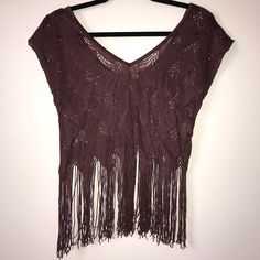 Kirra Fringe Crop Top. Can Be Worn As A Top Or As A Swimsuit Coverup. Never Worn. Brown. Size M/L. Summer Stretch Fringe Tops, Summer V-neck Top With Fringe, Summer V-neck Tops With Fringe Details, Summer V-neck Tops With Fringe, Casual V-neck Top With Fringe, One Size Casual Tops For Festivals, Casual One-size Tops For Festivals, One Size Brown Tops For Beach, One Size Fringe Tops For Spring