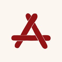 the letter a is made up of two red sticks and an orange stick in the shape of a triangle