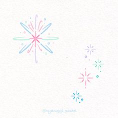 a white card with colorful fireworks and stars on the front, in pastel colors