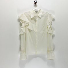 Nwt Express Cold Shoulder Sheer Ruffled Blouse Size M, Cream This Beautiful Blouse Is Perfect For Spring And Would Be Great Over A Tank Top Or Bralette. Excellent Condition With No Known Flaws. Please Note Color May Differ Slightly From The Color Shown In The Photo Due To Lighting. Purchase Two Or More Items For A 20% Off Discount And Free Shipping! Every Purchase Is Appreciated! - Shop With Confidence - Professional Seller - Fast Shipping - I Love Offers! - Follow Our Store @Thecrystalrack On I Summer Party Shirt With Ruffles, Spring Party Shirt With Ruffles, Office Shirt With Ruffled Collar And Details, White Ruffled Tops For Office, Chic Ruffled Office Blouse, Spring Office Blouse With Ruffles, Chic Long Sleeve Ruffled Shirt, Long Sleeve Ruffled Top For Office, Long Sleeve Ruffle Top For Office