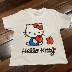 New! Cute Apple Design. Size: Small White Hello Kitty Graphic Tee, Playful White Hello Kitty T-shirt, Sanrio Clothes, Hello Kitty Shirt, Cut Tee Shirts, Hello Kitty T Shirt, Kitty Cafe, Kitty Clothes, Hello Kitty Crafts