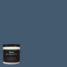 a can of dymasty paint on a dark blue background with the words dymasty written in white