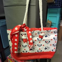 Sturdy Disney Minnie Mouse Tote With Rope Handles And Red Polka-Dot Handle. Still Has Original Tags Attached Canvas And Faux Leather With Solid Red Lining Inside. Approximately 11x15. Cute Red Bag For Disney Trips, Trendy Red Bags For Disney Trips, Cute Red Minnie Mouse Bag, Casual White Minnie Mouse Bag, Cute Red Beach Bag, Disney Minnie Mouse Red Bags, Red Minnie Mouse Bag For Daily Use, Casual Minnie Mouse Bag For Everyday Use, Red Mickey Mouse Casual Bag