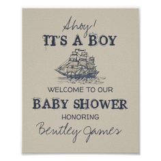 a baby shower sign that says it's a boy