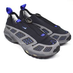 NWT Nike 1999 Air Sunder Max (Black/Royal/Gray) (173169-041) Guaranteed 100% authentic and genuine RARE SNEAKER, IMPOSSIBLE TO FIND IN THIS CONDITION! New / unworn Deadstock 1999 release Black knit upper with royal blue and gray blue accents  Zipper opening with 'Nike' engraved zipper  Reflective accents along side  'AIR logos on toebox and back tab '6453' on tongue  Dark gray midsole with full length Nike Air Max technology Vintage shoe with great traction on outsole  Comes with original box No Nike Outdoor Sneakers With Vented Sides, Rare Sneakers, Max Black, Mens Nike Air, Blue Accents, Black Knit, Vintage Shoes, On Shoes, Air Max