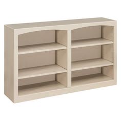 a white bookcase with three shelves on each side