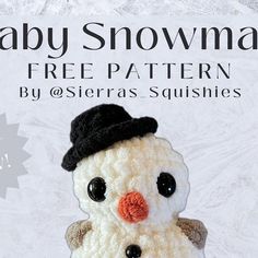 a crocheted snowman with a black hat and scarf on it's head