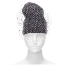 JENNIFER BEHR grey charcoal crystal beads veil round top beanie hat Reference: AAWC/A00927 Brand: Jennifer Behr Material: Fabric Color: Grey, Clear Pattern: Crystals Closure: Slip On Lining: Grey Fabric Extra Details: Crystal embellished back. CONDITION: Condition: Excellent, this item was pre-owned and is in excellent condition. This piece appears to be unworn and is in great condition. MEASUREMENTS: Length: 23cm / 9" Width: 38cm / 14.8" This Jennifer Behr item is authentic. Silver Short Brim Evening Hat, Adjustable Brimmed Gray Cloche Hat, Luxury Silver Evening Hat, Behr Gray, Silver Crystal Round Brooches, Warm Gray Acrylic Beanie, Beaded Veils, Top Round, Grey Fabric