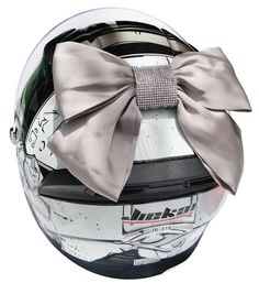 a helmet with a large bow on it