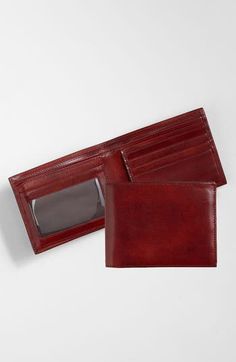 Hand-stained, vegetable-dyed Italian leather elevates a smart wallet with a fold-out ID window. Interior ID window; currency pouch; eleven card slots Leather Imported Men's Furnishings Classic Trifold Wallet With Id Window, Business Leather Trifold Wallet With Id Window, Leather Trifold Wallet With Id Window, Business Cognac Bifold Wallets, Cognac Bifold Wallet With Smooth Grain, Cognac Bifold Wallet With Interior Card Slots, Cognac Bifold Wallet With Coin Pocket, Smart Wallet, Best Wallet