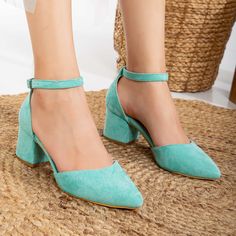 Handcrafted with care and passion from premium aqua blue suede vegan leather, you can embrace your wedding day in comfort and style. These turquoise wedding pumps are here to witness and support every step of your journey. Box Contents: Your package will include 2 distinct sets of Ankle Straps: 1 x Double Pearl Ankle Strap with Ribbon1 x The standard Aqua Blue Suede Ankle straps. Suede. To protect your shoes from dampness, apply a waterproof spray when they're new. For cleaning, use a mild soap solution and wipe the surface with a damp cloth that has been wrung out. Wedding Block Heels, Heels For Bride, Shoes With Pearls, Blue Low Heels, Waterproof Spray, Aqua Blue Wedding, Boho Wedding Shoes, Blue Block Heels, Blue Bridal Shoes