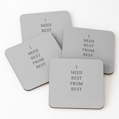 four coasters that say i need rest from rest on the top one is white with black lettering