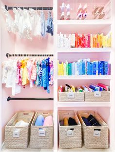 an organized closet with clothes, shoes and other items in bins on the shelves