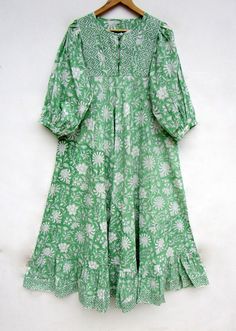 "ITEM DESCRIPTION greenery floral printed cotton long maxi dress - Henley neckline with button maxi dress - 3/4th sleeve with button maxi dress Features: 3/4th sleeve, Henley neck, Long dress Material: Cotton cambric Fabric: 100% cotton soft light weight ethnic print fabrics  Sleeve Length = 18 inch For more sizes & their measurement, please refer our below chart to understand the sizes variations available with us For your size requirement, please mention your size in seller note at the time of buying. SIZE MEASUREMENT  BUSTLENGTHSHOULDER XXS34 inch51 inch13.5 inch XS36 inch51 inch14 inch S38 inch51 inch14.5 inch M40 inch51 inch15 inch L42 inch51 inch16 inch XL44 inch51 inch16.5 inch 2XL46 inch51 inch17 inch 3XL48 inch51 inch18 inch   Company Return Policy:  Please write for more informat Green Half Sleeve Maxi Dress For Summer, Green 3/4 Sleeve Summer Midi Dress, Green 3/4 Sleeve Midi Dress For Summer, Green Summer Midi Dress With 3/4 Sleeves, Green Cotton Half Sleeve Dress, Green Printed Half-sleeve Dress, Flowy Green Cotton Midi Dress, Green Printed Half Sleeve Dress, Green 3/4 Sleeve Maxi Dress For Summer