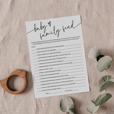 a baby's formula is on top of a sheet of paper next to a plant