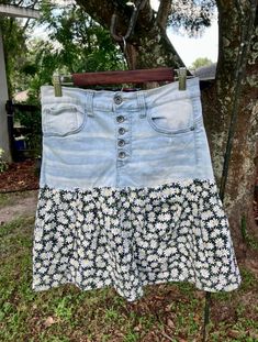 One of a kind denim/floral pleated skirt. Upcycled from pre loved materials. Size 11/30 Spring Medium Wash Tiered Skirt, Tiered Denim Skirt For Spring, Spring Denim Lined Skirt, Spring Denim Flowy Skirt, Flowy Denim Skirt For Spring, Summer Denim Bottoms With Floral Patchwork, Casual Medium Wash Floral Print Bottoms, Lined Denim Skirt For Spring Day Out, Casual Denim Tiered Skirt For Spring