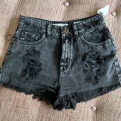 Edgy Black Jean Shorts. Rips In Front And Back. Frayed Bottom. Distressed Grunge Washed Black Shorts, Distressed Washed Black Grunge Shorts, Washed Black Distressed Grunge Shorts, Grunge Distressed Washed Black Shorts, Edgy Washed Black Shorts, Black Cotton Shorts With Frayed Hem, Edgy Black Bottoms With Frayed Hem, Casual Black Distressed Jean Shorts, Black High Rise Bottoms In Grunge Style