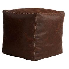 a square brown leather ottoman with stitching on the sides and nail holes in the middle