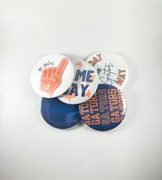 What's college football without some team swag?!  Button Up Your Spirit wants to deck you out in the most fun and detailed designs for any occasion. Whether you're a parent, athlete, or die-hard fan, I want to help you Button Up Your Spirit! All buttons press at 3 inches in size Gameday Buttons, Spirit Buttons, Button Ideas, Sorority Merch, Florida Gators, Greek Life, Die Hard, Button Design, College Football