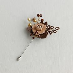 Leather flower Lover pin Handmade Hat pin beaded flower brooch can be a beautiful Wedding boutonniere lapel pin. The leather flower brooch made with faux Pearl beads, Sunstone beads and seed beads.  The length of the leather flower lapel pin  is 4.0 inches   Lapel pin leather Diameter is approximately 2.0 inches Color - beige, khaki, brown Exquisite leather brooch is perfect men flower lapel pin for any clothes. Add class to your look with this handmade plant brooch! This branch flower pin/ beaded shawl pin can be a beautiful gift!  More brooches and pins can see here:  https://etsy.me/3eBaTnB Beaded Bouquet, Brooch Wedding, Flower Lapel, Wedding Boutonniere, Flower Lapel Pin, Handmade Plant, Jewelry Brooch, Leather Flower, Brooch Bouquets