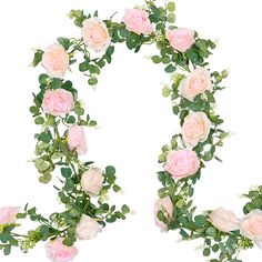 the letter o is made up of pink roses and greenery