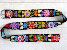 Peruvian embroidered belt floral colorfulThese belts are densely embroidered using dozens of colors naturals and each one is unique. Elegant floral design and a pleasure to wear, it will bring joy to you through its visual beauty as you will want to wear it time and time again.Each belt 5 sets of holes spaced 2" apart so they are versatile. You can wear the same belt on your waist or hips. They also stretch slightly, like a pair of jeans, and will conform to your body after a few days of wear.Si Multicolor Fabric Belt In Folk Style, Multicolor Folk Fabric Belt, Folk Style Multicolor Fabric Belt, Folk Style Multicolor Embroidered Belt, Folk Multicolor Embroidered Belt, Bohemian Multicolor Embroidery Belts For Festival, Handmade Multicolor Belt For Festivals, Handmade Multicolor Belts For Festival, Handmade Bohemian Belt With Multicolor Embroidery