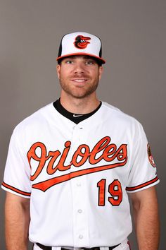 a professional baseball player poses for a photo