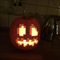 a pumpkin with an evil face carved into it