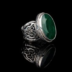 Indulge in timeless elegance with our Emerald Silver Ring, meticulously crafted from 925 Sterling Silver. Adorned with a mesmerizing Emerald stone, boasting dimensions of 24 x 17 mm, this ring captivates with its natural beauty. The average weight of 22 grams varies based on your selected ring size, ensuring a perfect fit. Each piece is expertly designed to exude sophistication and charm. Elevate your style with this exquisite ring, perfect for both casual and formal occasions. Treat yourself or Luxury Agate Men's Ring For Formal Occasions, Luxury Men's Sterling Silver Ring With Accent Stones, Luxury Men's Green Sterling Silver Ring, Luxury Elegant Men's Agate Ring, Luxury Green Sterling Silver Men's Ring, Stone Ring Men, Emerald Stone Ring, Emerald Stone Rings, Hip Hop Rings