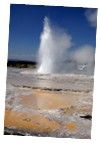 a geyser spewing water into the sky