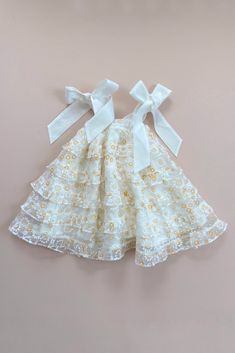 A fabulously feminine flouncy oversized bow dress in a Daisy Floral Burnout Organza with ruffle feature. This full circle dress features an oversized self-tying bow shoulder straps to create an adjustable length that will sit perfectly in place to grow with your little one. Soft elastic is gathered at chest for carefree comfort. Perfect for your little girl to celebrate at a birthday party, wedding, christening, eid, family photoshoot, or any other special occasion. Looking for our matching Wome Full Circle Dress, Daisy Fields, Mary Dress, Daisy Field, Mary Mary, Baby Fits, Circle Dress, Christening Dress, First Birthday Outfits