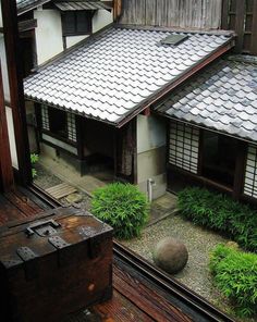 an old japanese house is shown from above