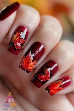 🍂 Embrace the season with these gorgeous deep red nails adorned with vibrant autumn leaves. Ideal for fall, these nails capture the essence of autumn perfectly. Find more fall nail ideas and tips at NailHow.com! 🍁 Autumnal Red Nails, Red Nails With Leaves, Nails With Autumn Leaves, Red Fall Nails With Leaves, Red Fall Nails 2024, 2025 Nails, Summer Nails Colors Designs, Trend Nails, Deep Red Nails