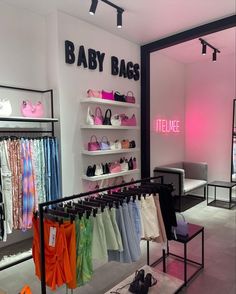 the baby bag store is filled with clothes and shoes